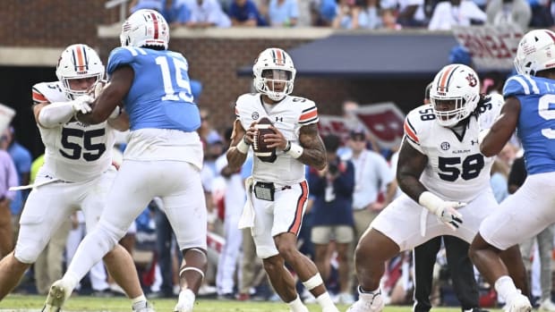 Oct 15, 2022; Oxford, Mississippi, USA; Auburn Tigers quarterback Robby Ashford (9) looks to pass against the Mississippi Rebels during the fourth quarter at Vaught-Hemingway Stadium. Mandatory Credit: Matt Bush-USA TODAY Sports